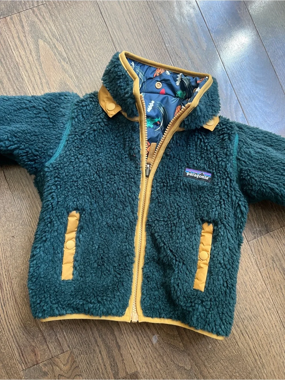 Patagonia Navy Surf Print Reversible Tribbles Jacket with hood size 2T
